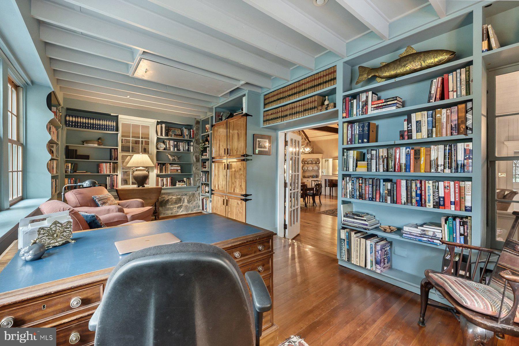 17677 Raven Rocks Road Bluemont, VA 20135 - Photo 54 of 77 a view of a workspace with furniture and a book shelf