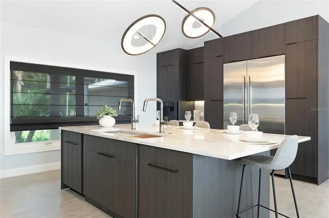 a bedroom with a bed and ceiling fan