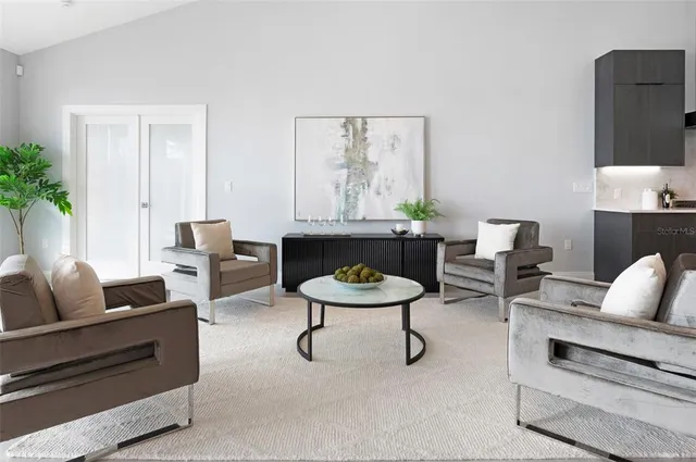 a bath tub sitting next to a white shower and a sink