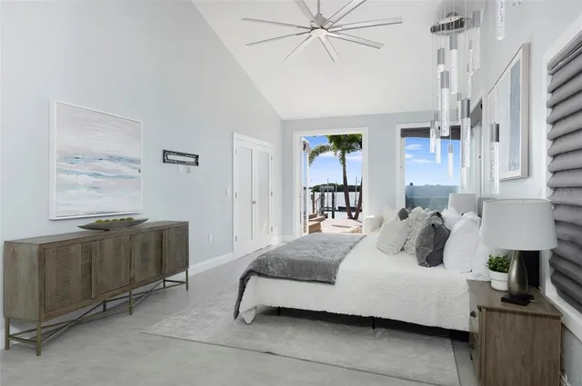 a bathroom with a sink double vanity granite tub shower and a mirror