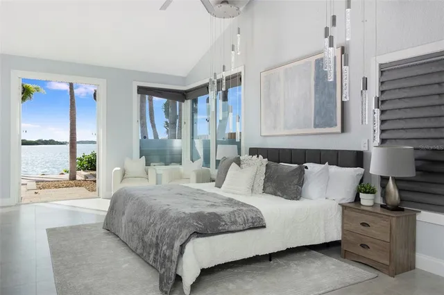 a bathroom with a granite countertop sink mirror and shower