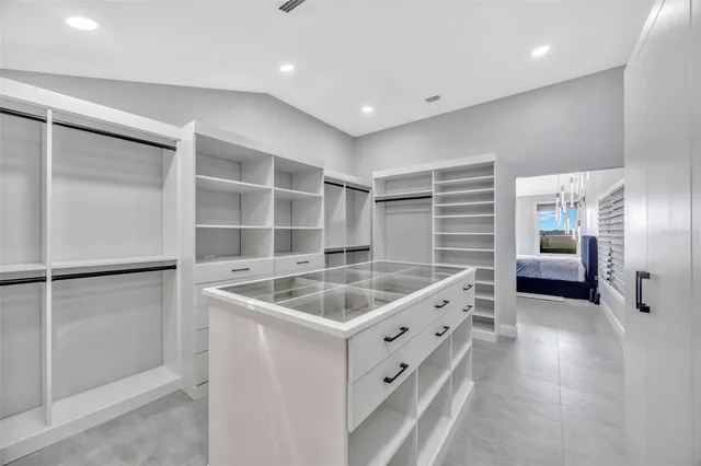 a view of a porch with chairs and backyard