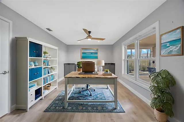 a view of a swimming pool with a lounge chair