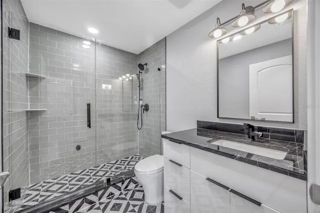 a view of swimming pool with seating space