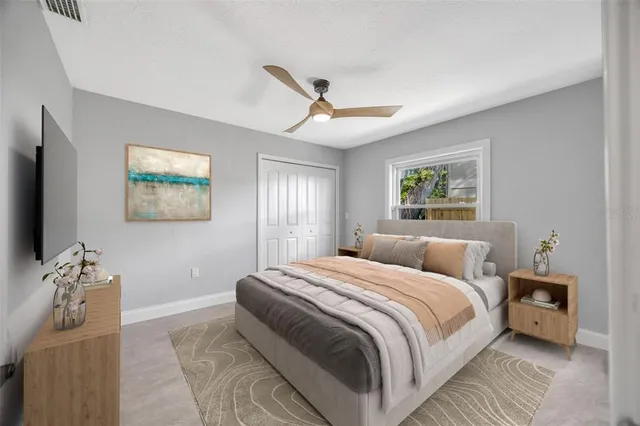 a view of a house with swimming pool and sitting area