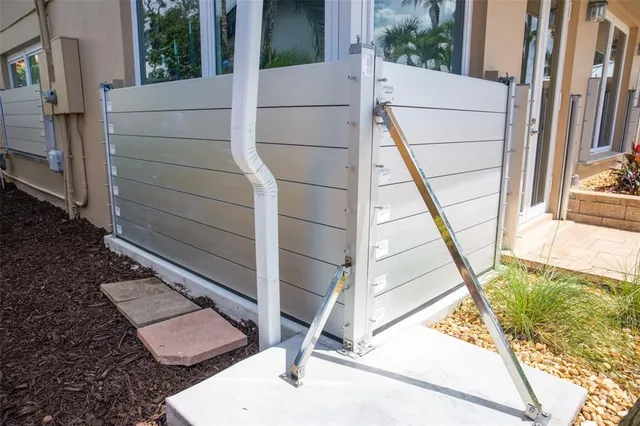 a view of a swimming pool with a lounge chair