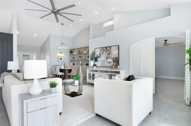 a dining room with furniture and window