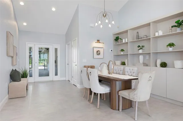 a kitchen with a sink and appliances