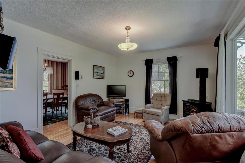 38 Fifield Point Road Stonington, ME 04681 - Photo 18 of 41 Living Room looking towards Dining Room