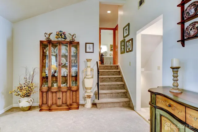 workspace with wooden floor and stairs