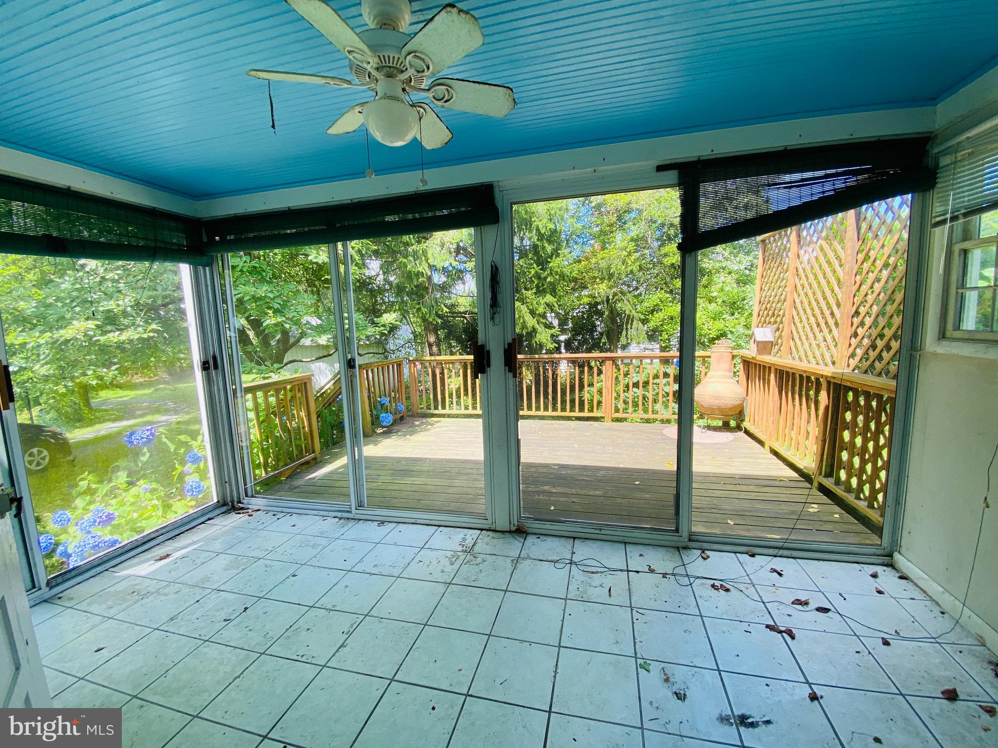 708 Olney Sandy Spring Road Sandy Spring, MD 20860 - Photo 14 of 26 Enclosed Porch and side deck