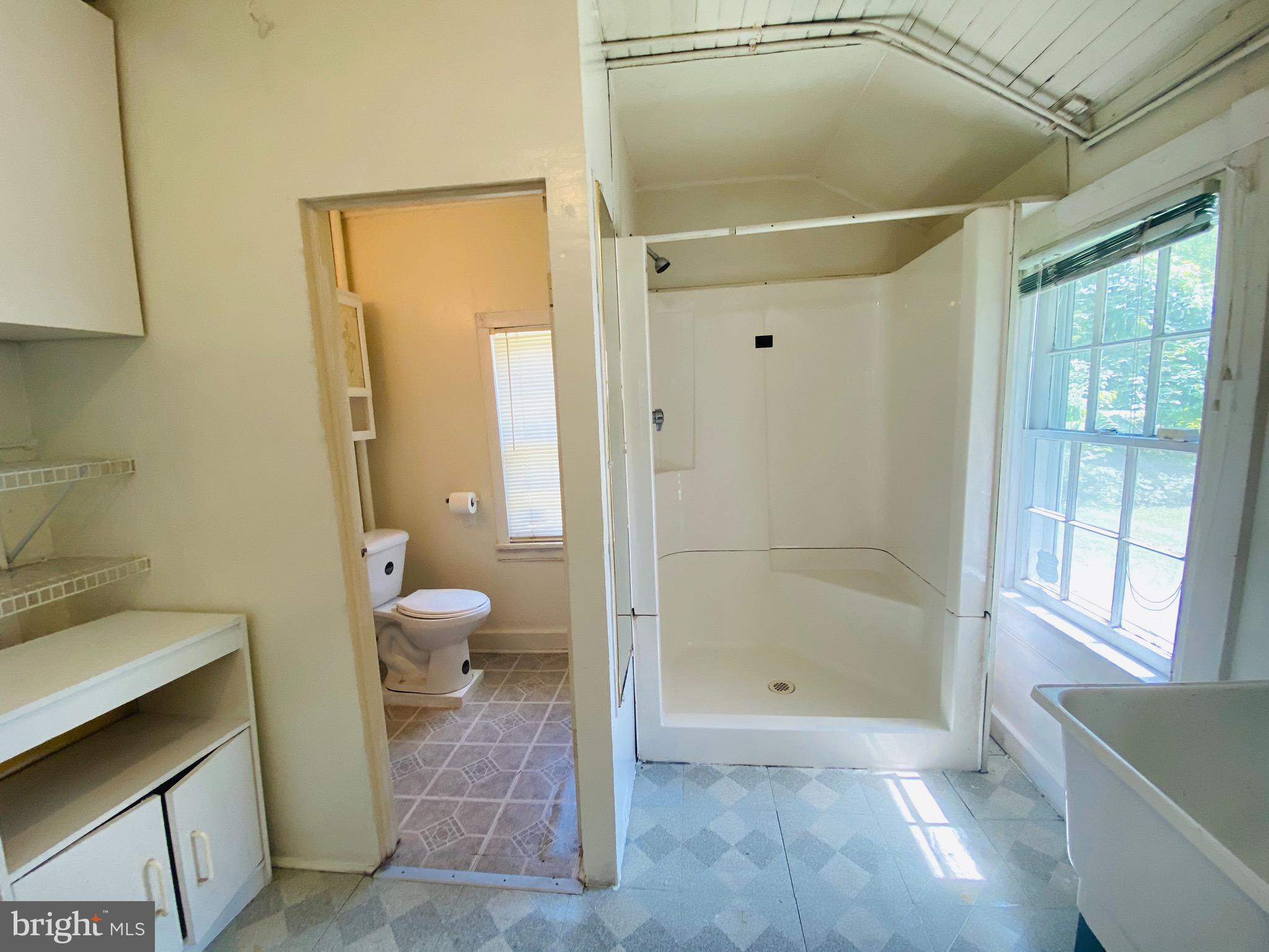 708 Olney Sandy Spring Road Sandy Spring, MD 20860 - Photo 21 of 26 2nd Full Bathroom (pic 2, sep shower & Laundry Rm)