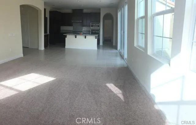 a view of cabinets and window