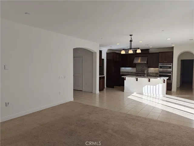 a view of a kitchen with a sink