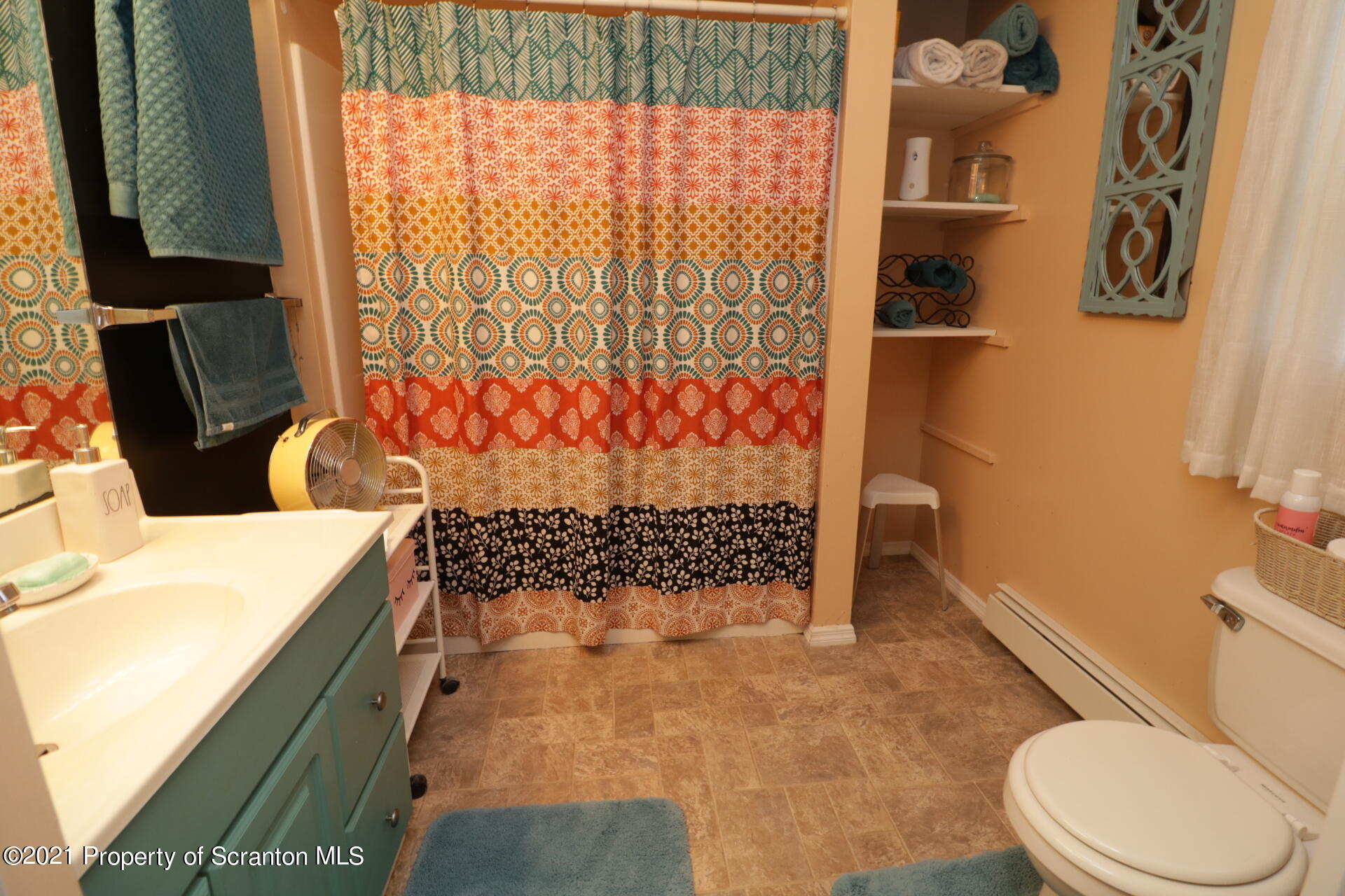 4 Prospect Street Simpson, PA 18407 - Photo 14 of 41 a bathroom with a toilet and shower