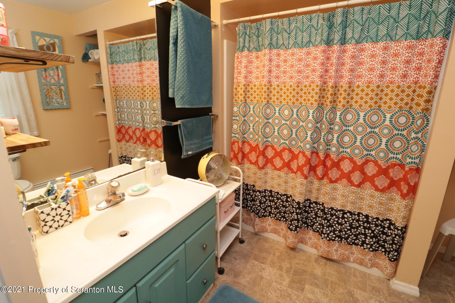 4 Prospect Street Simpson, PA 18407 - Photo 15 of 41 a bathroom with a sink and a mirror