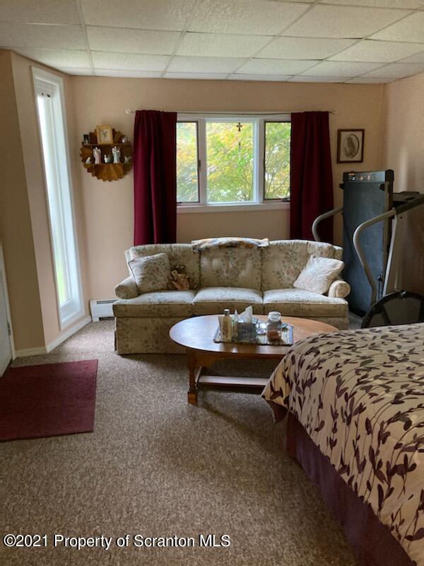 4 Prospect Street Simpson, PA 18407 - Photo 18 of 41 a living room with furniture and a large window