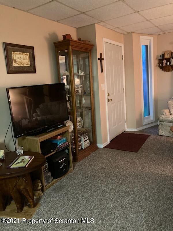 4 Prospect Street Simpson, PA 18407 - Photo 19 of 41 a living room with furniture and a flat screen tv