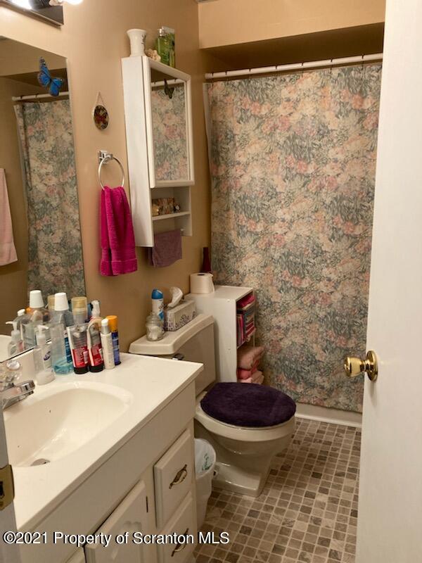 4 Prospect Street Simpson, PA 18407 - Photo 22 of 41 a bathroom with a sink toilet and shower