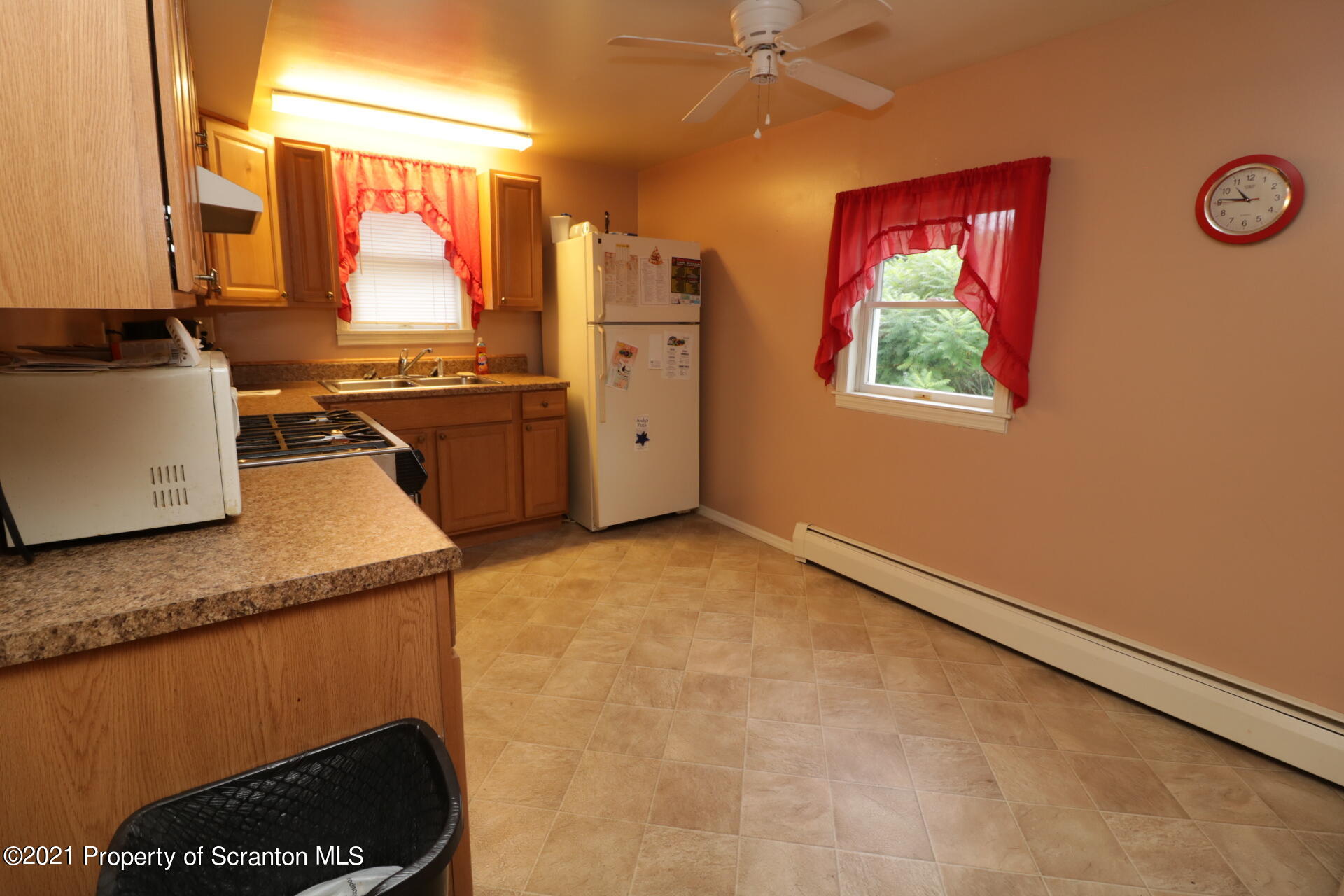 4 Prospect Street Simpson, PA 18407 - Photo 25 of 41 a kitchen with stainless steel appliances granite countertop a stove a sink and a microwave