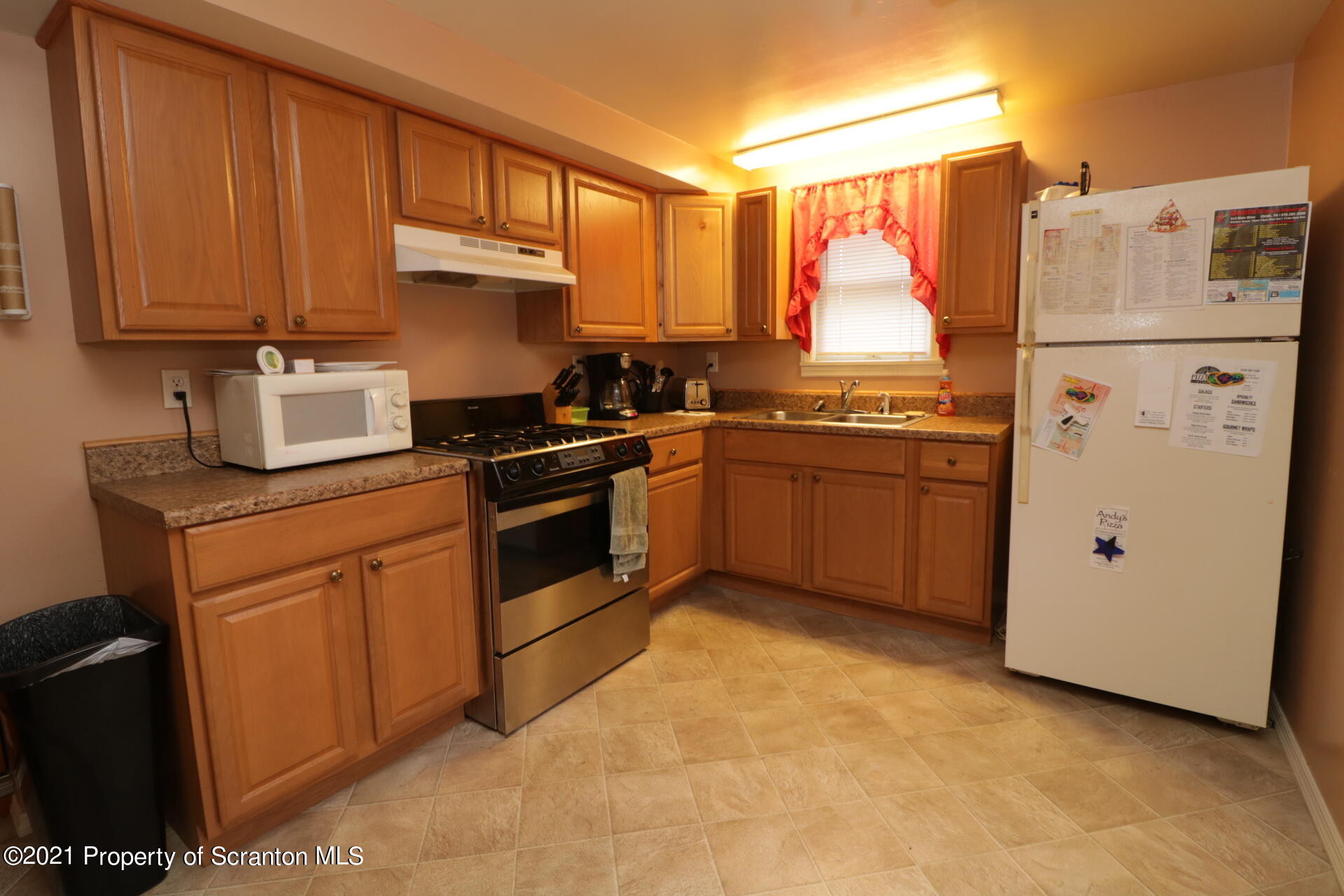 4 Prospect Street Simpson, PA 18407 - Photo 26 of 41 a kitchen with stainless steel appliances granite countertop a refrigerator stove and sink