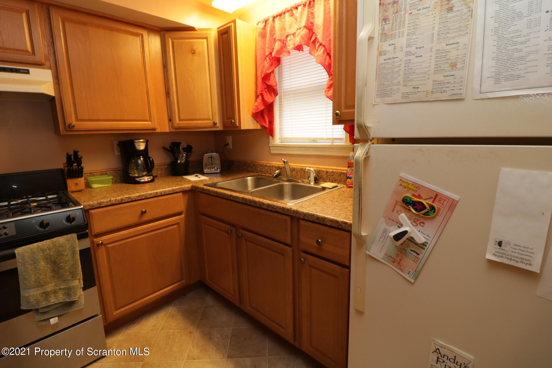 4 Prospect Street Simpson, PA 18407 - Photo 28 of 41 a kitchen with stainless steel appliances granite countertop a sink and a microwave