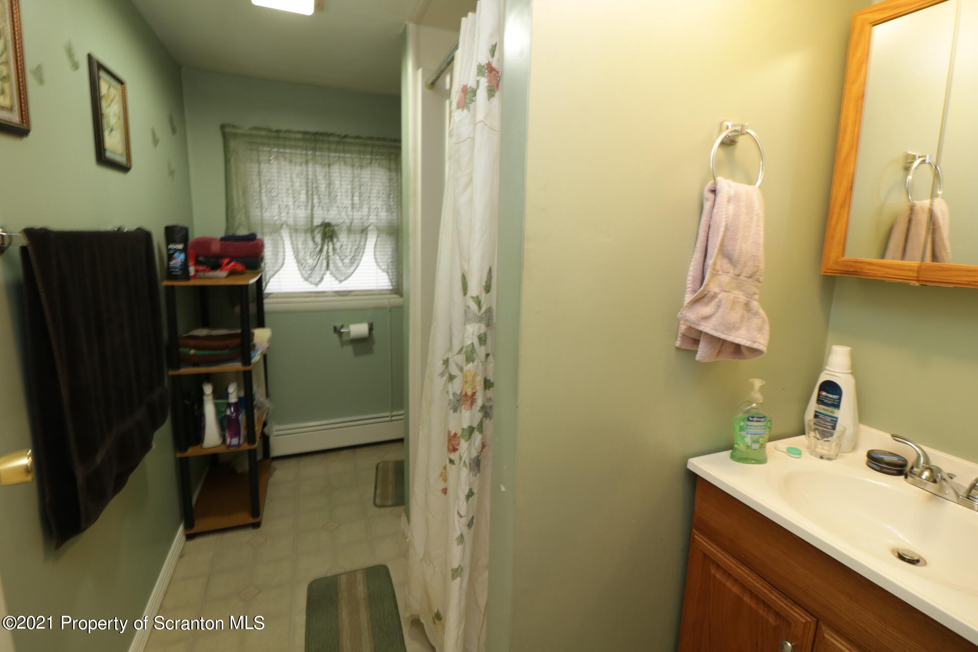 4 Prospect Street Simpson, PA 18407 - Photo 30 of 41 a bathroom with a sink vanity and a mirror