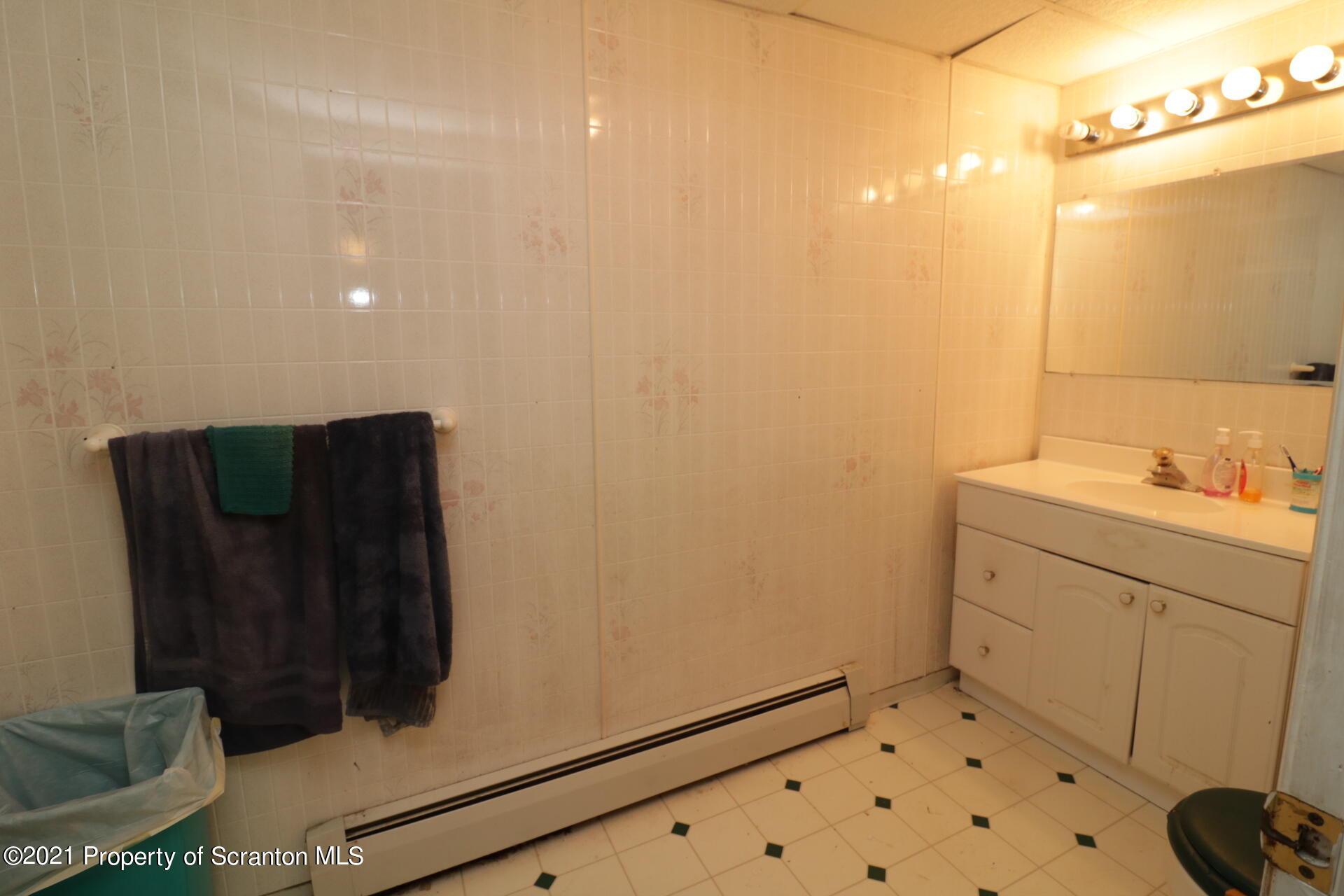 4 Prospect Street Simpson, PA 18407 - Photo 37 of 41 a bathroom with a sink and a mirror