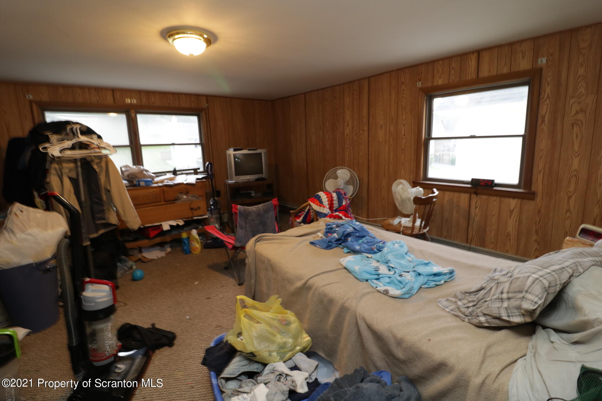 4 Prospect Street Simpson, PA 18407 - Photo 39 of 41 a bed room with furniture and a window