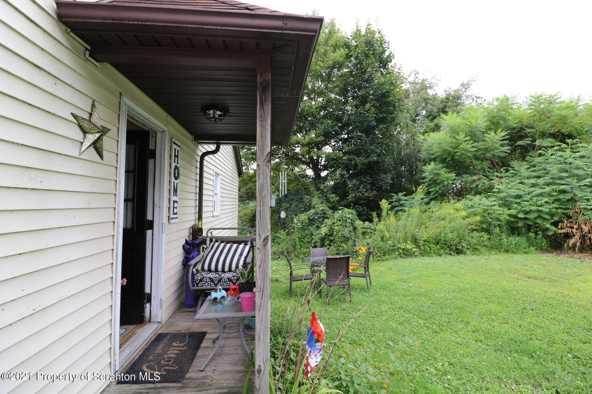 4 Prospect Street Simpson, PA 18407 - Photo 4 of 41 an outdoor view of garden with patio