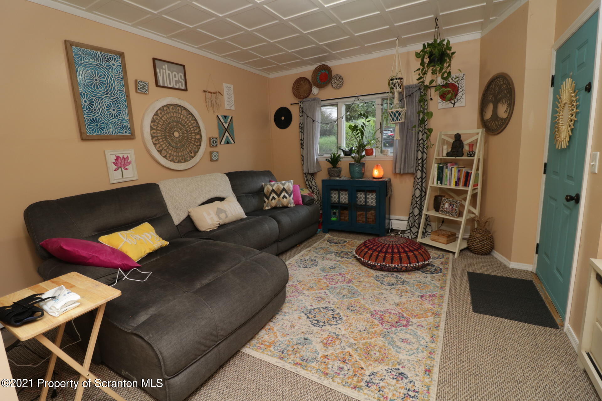 4 Prospect Street Simpson, PA 18407 - Photo 5 of 41 a living room with furniture and a window