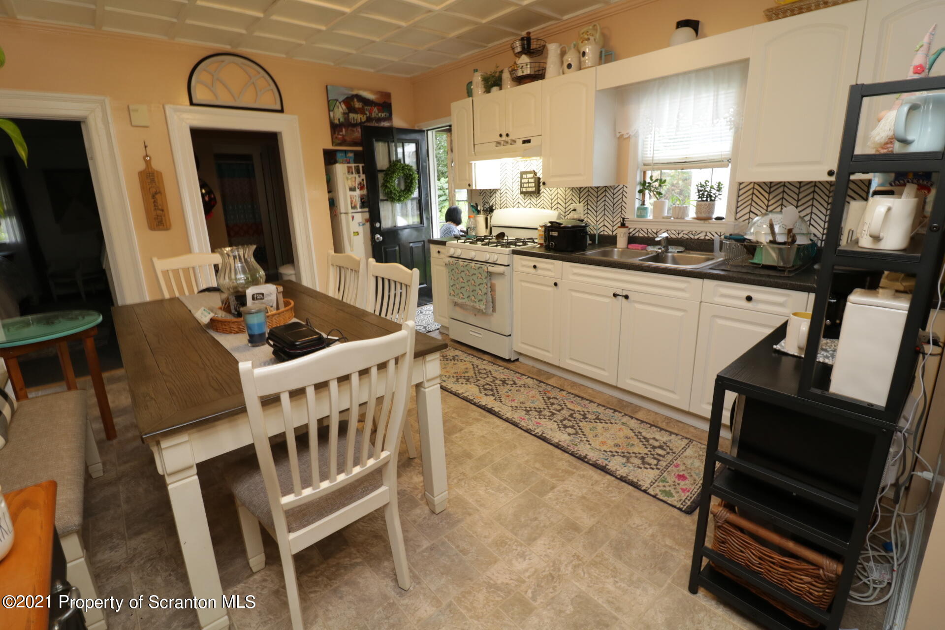 4 Prospect Street Simpson, PA 18407 - Photo 8 of 41 a kitchen with sink cabinets and window
