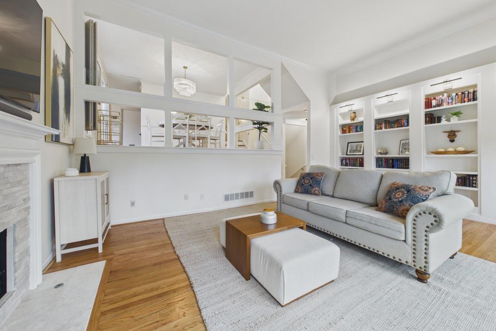 100 Colony Ridge Drive Alpharetta, GA 30022 - Photo 1 of 47 a living room with furniture and a rug