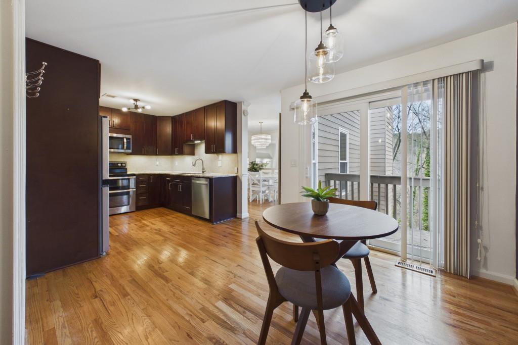 100 Colony Ridge Drive Alpharetta, GA 30022 - Photo 11 of 47 a view of a dining room with furniture window and wooden floor
