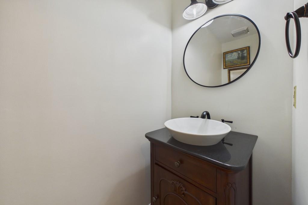 100 Colony Ridge Drive Alpharetta, GA 30022 - Photo 17 of 47 a bathroom with a sink and a mirror