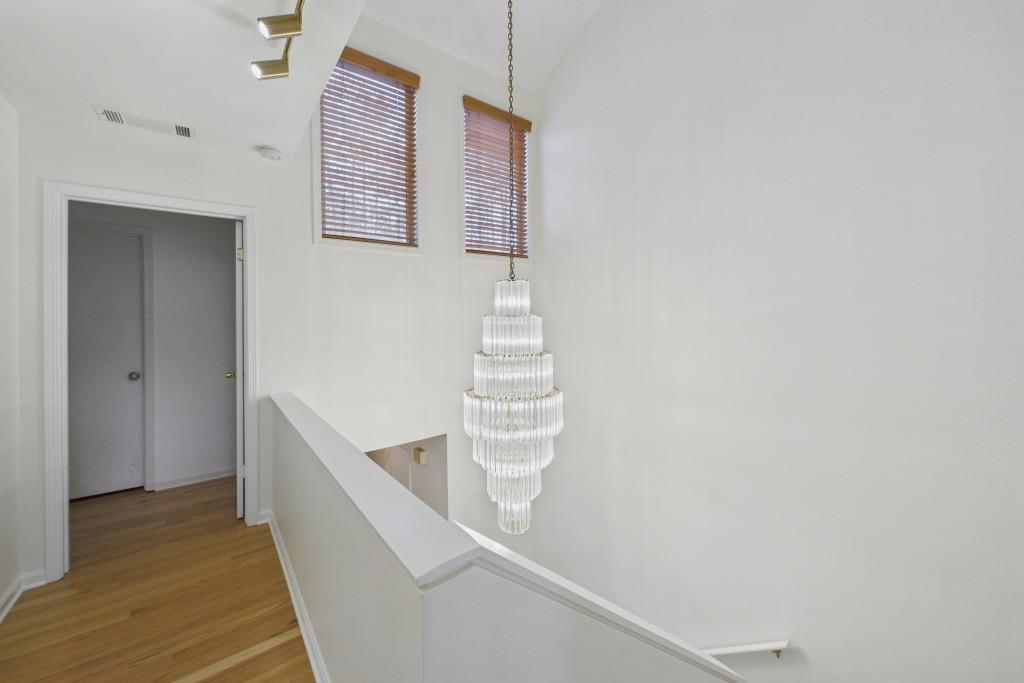 100 Colony Ridge Drive Alpharetta, GA 30022 - Photo 18 of 47 a view of entryway and hall with wooden floor