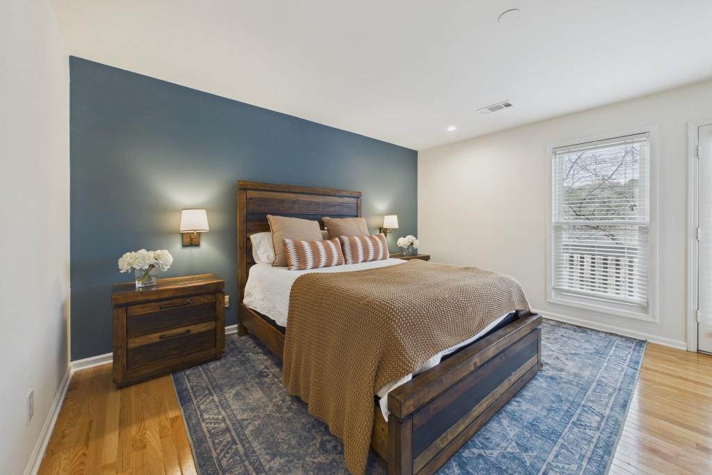 100 Colony Ridge Drive Alpharetta, GA 30022 - Photo 19 of 47 a bed room with a bed and a night stand