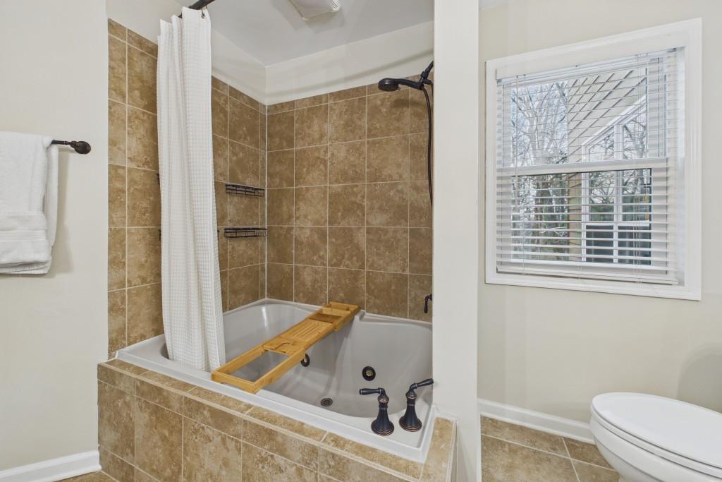 100 Colony Ridge Drive Alpharetta, GA 30022 - Photo 24 of 47 a bathroom with a tub and a sink