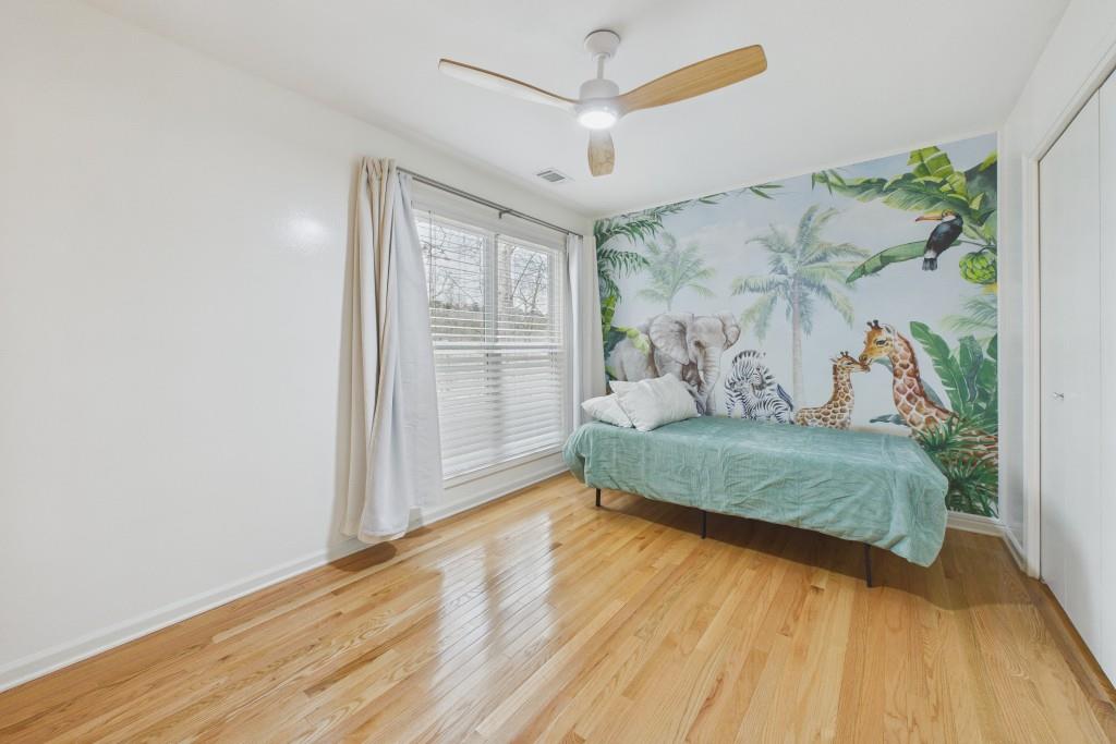100 Colony Ridge Drive Alpharetta, GA 30022 - Photo 27 of 47 a bedroom with a bed and a window