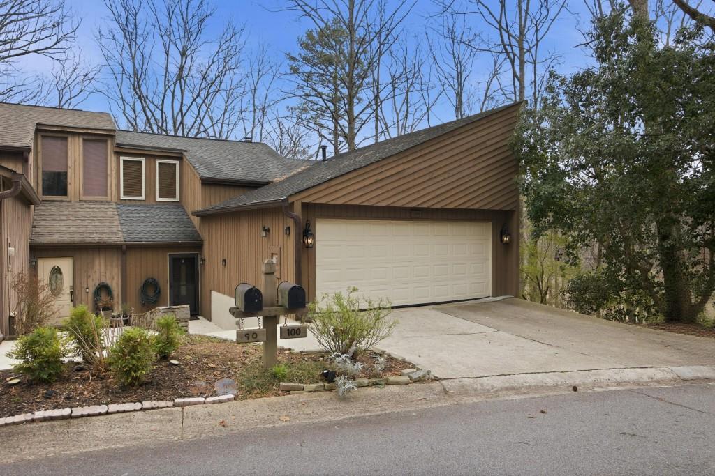 100 Colony Ridge Drive Alpharetta, GA 30022 - Photo 3 of 47 a backyard of a house with table and chairs