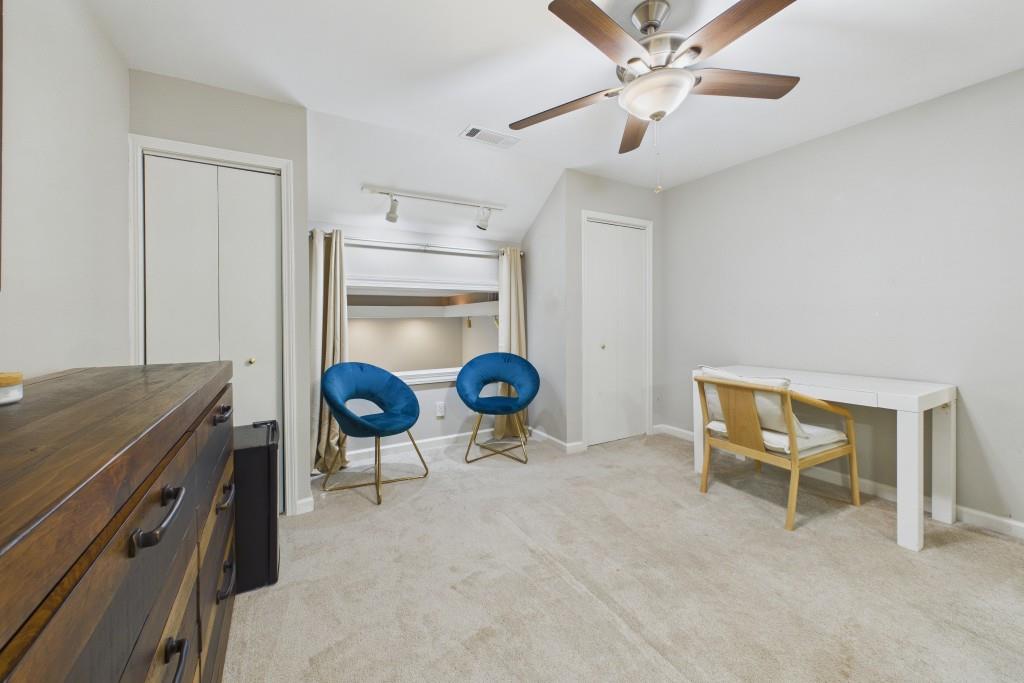 100 Colony Ridge Drive Alpharetta, GA 30022 - Photo 35 of 47 a living room with furniture and a table