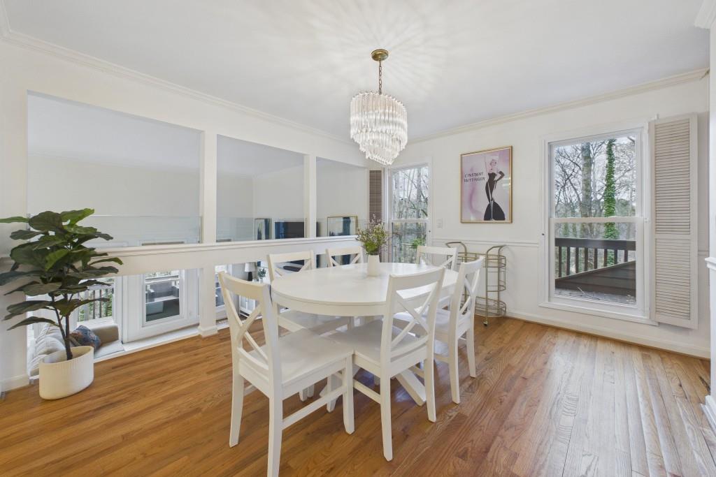 100 Colony Ridge Drive Alpharetta, GA 30022 - Photo 9 of 47 a view of a dining room with furniture window and wooden floor