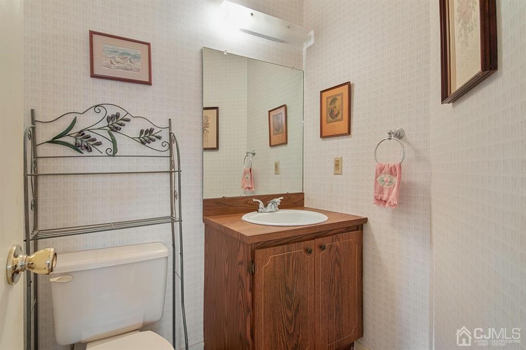 67 Redbud Road Piscataway, NJ 08854 - Photo 7 of 23 a bathroom with a sink and a mirror