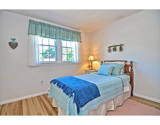 48 Everett Circle Stoughton, MA 02072 - Photo 12 of 34 a bedroom with a bed and a window