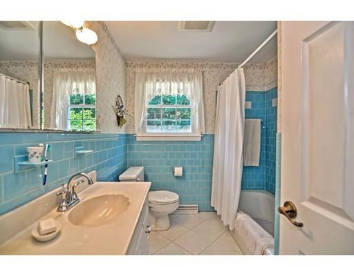 48 Everett Circle Stoughton, MA 02072 - Photo 19 of 34 a bathroom with a sink toilet and shower