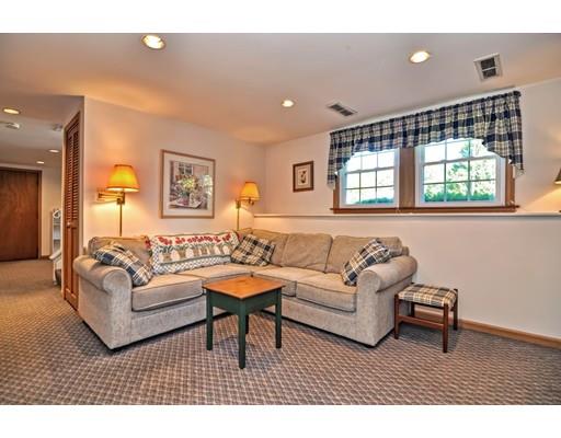 48 Everett Circle Stoughton, MA 02072 - Photo 22 of 34 a living room with furniture and a window