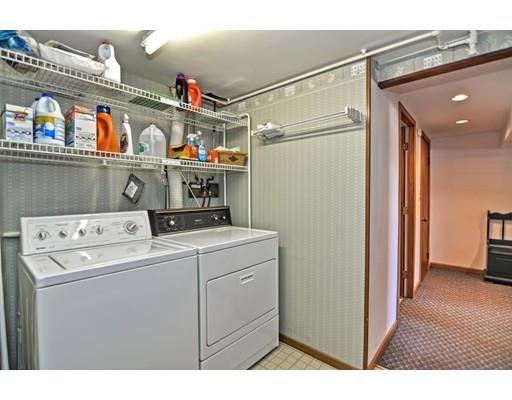 48 Everett Circle Stoughton, MA 02072 - Photo 27 of 34 a utility room with dryer and washer