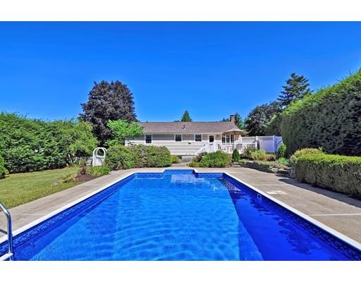 48 Everett Circle Stoughton, MA 02072 - Photo 29 of 34 a view of swimming pool outdoor seating and hardwood