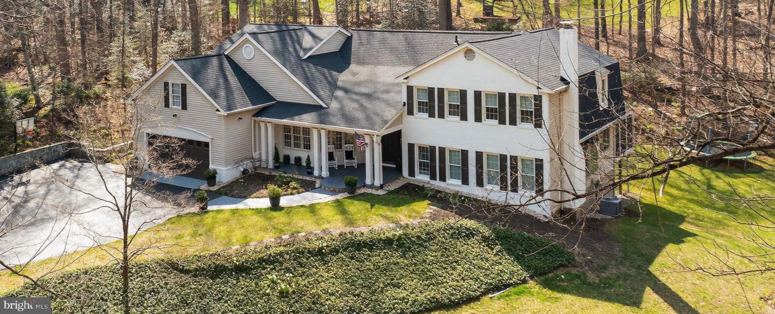 11728 Stuart Mill Road Oakton, VA 22124 - Photo 2 of 68 Charming home nestled in serene woods.