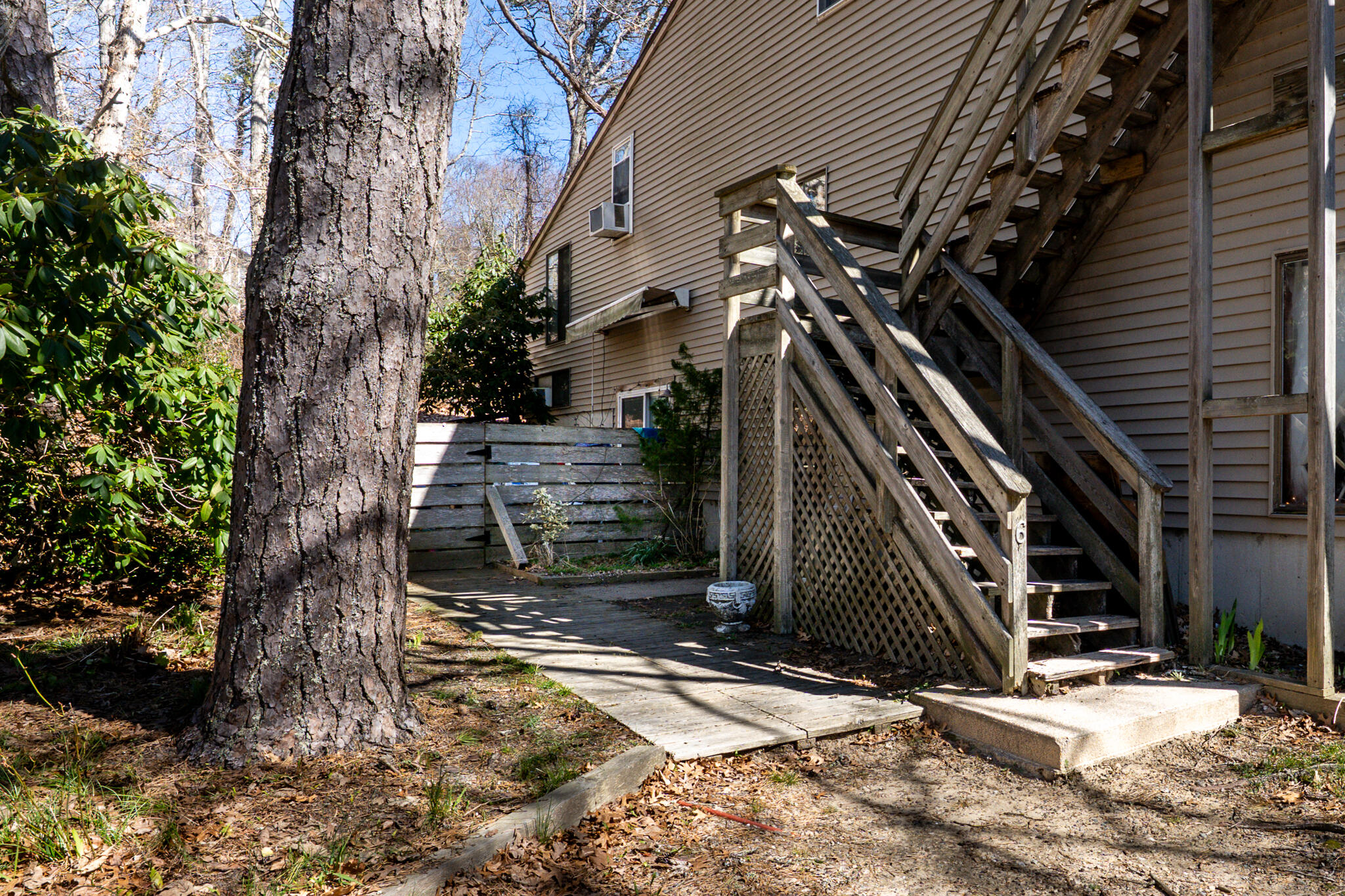34 Erics Way, Unit G 7 Wellfleet, MA 02667 - Photo 18 of 24 a view of a house with a tree
